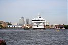 Coastal Celebration leaving Tower Bridge Lower cruise terminal with Canary Wharf in the background