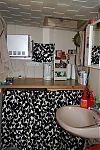 Kitchenette with curtain