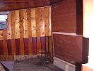 The starboard window in the captain's cabin bedroom plus the original floorboards and hull peeking out