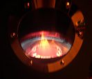 A warm blue flame burns in the diesel stove